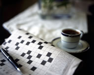 Crossword and coffee. &copy;anaimd/istockphoto.com