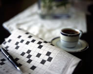 Crossword and coffee &copy; anaimd/istockphoto.com