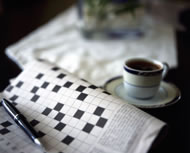 Crossword and coffee &copy; anaimd/istockphoto.com
